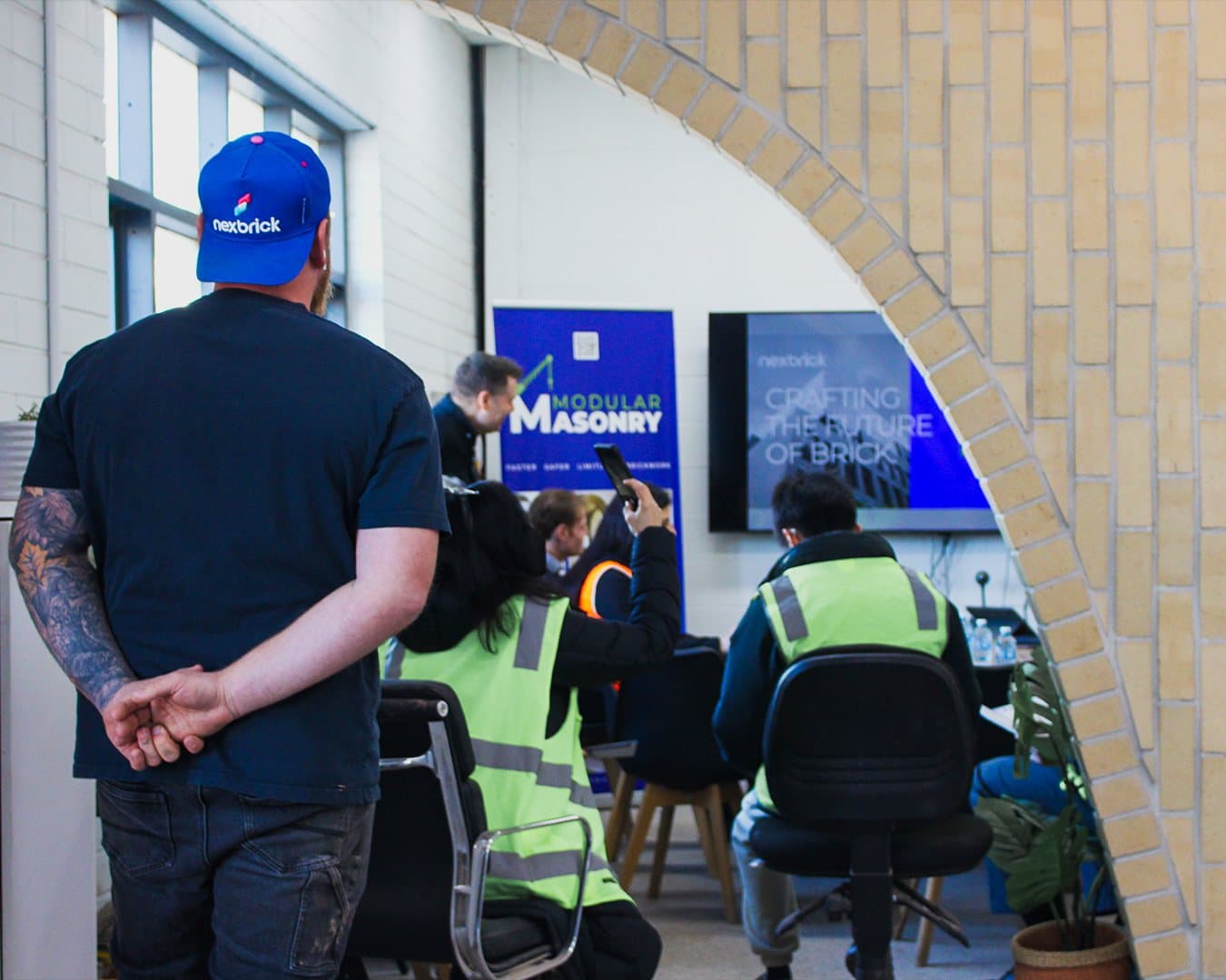 Architects and builders in the Modular Masonry showroom during a Nexbrick session