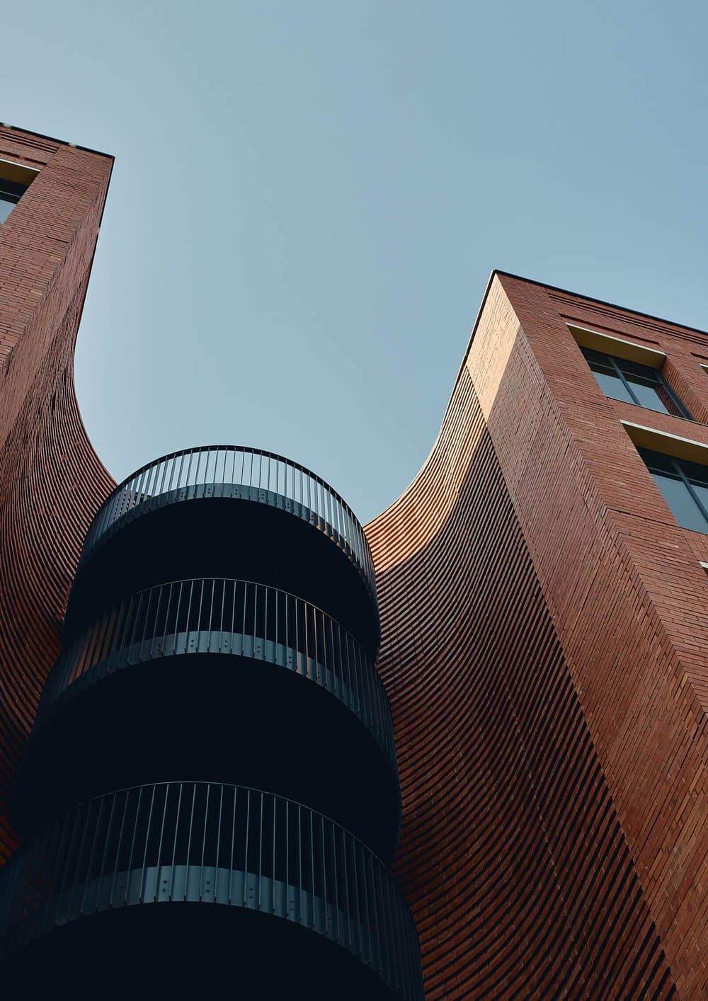 Contemporary brick towers with spiral stair detail