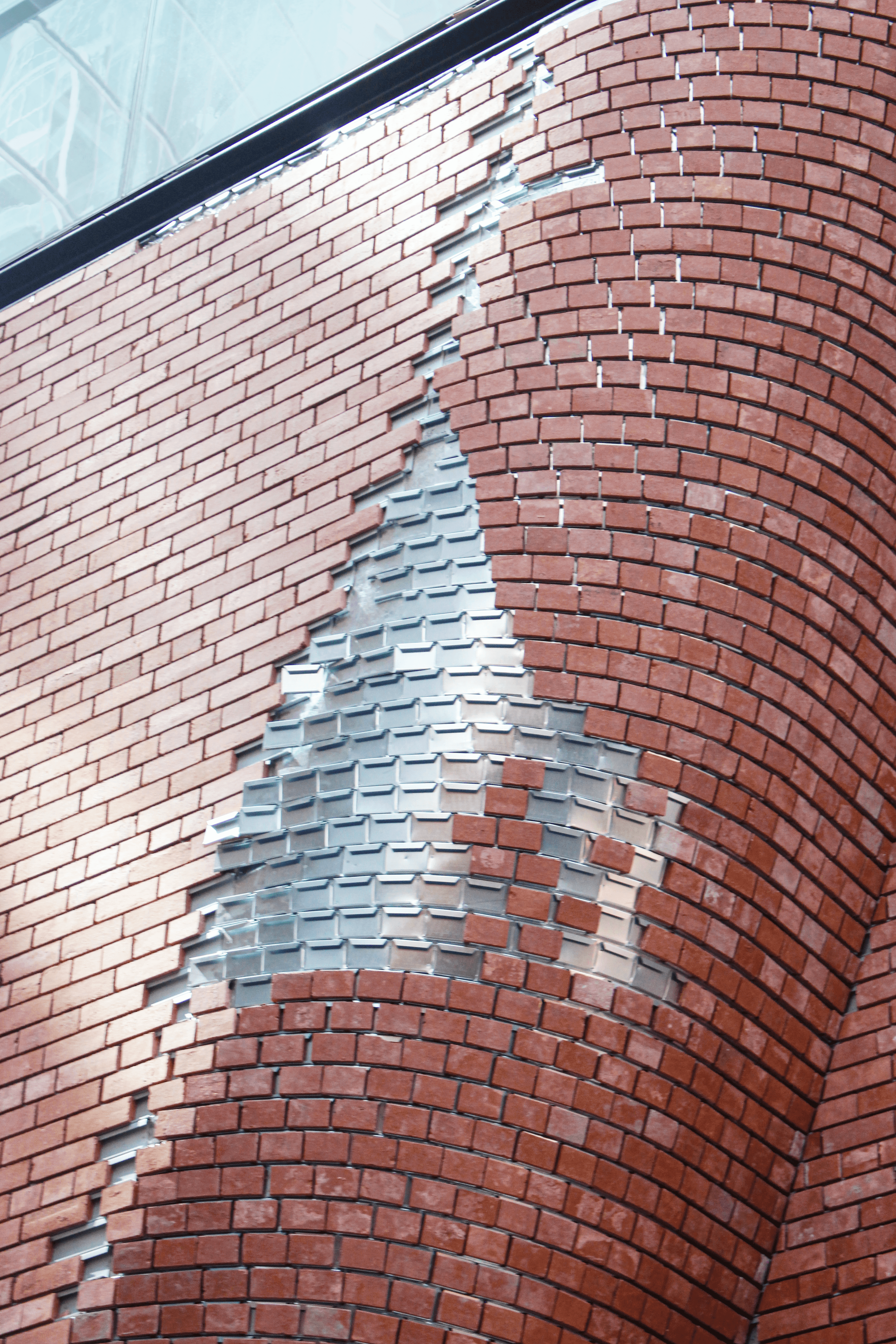 Bennett's Lane — curved brick facade detail